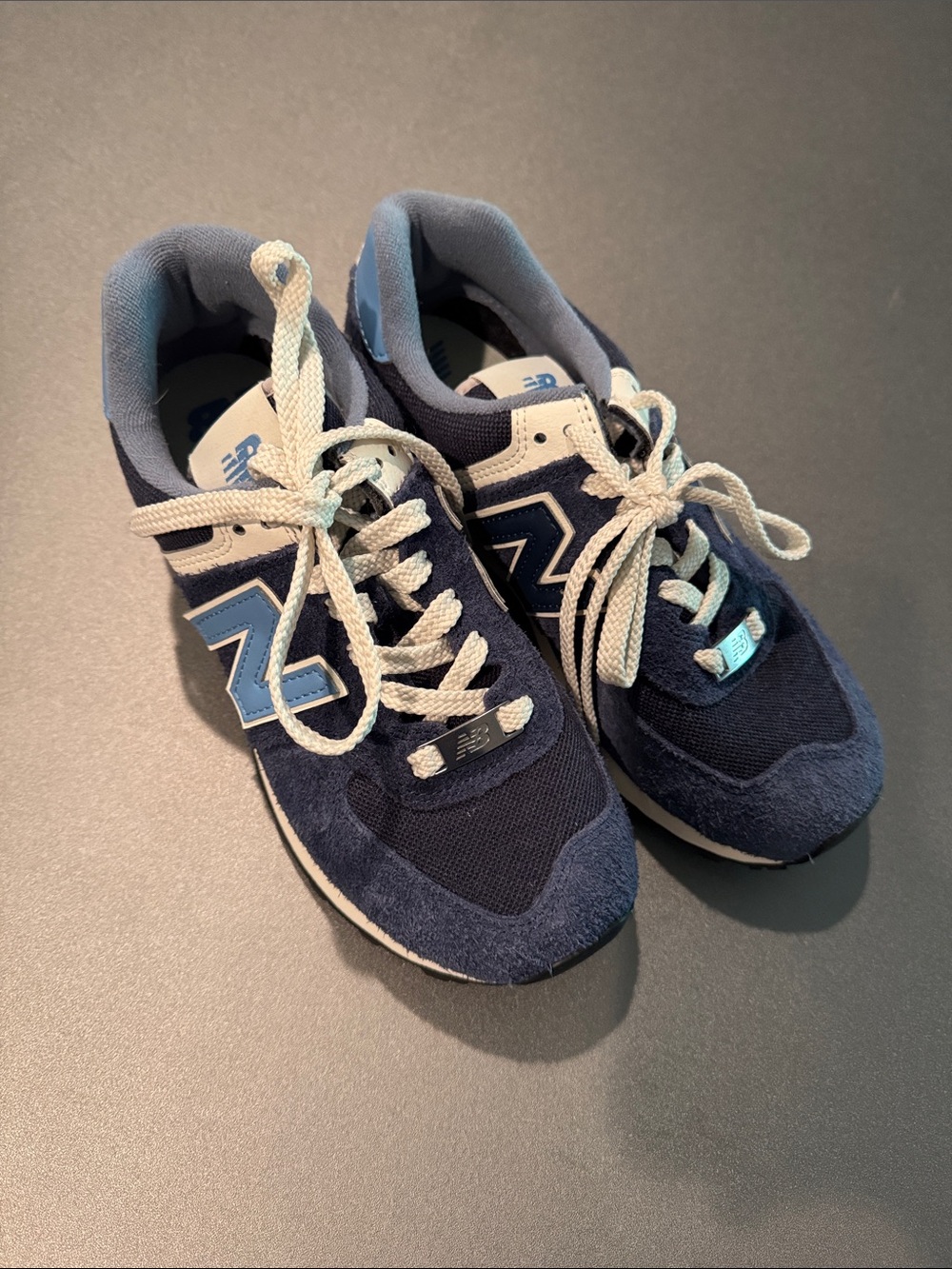 New Balance 574 Navy with Light Blue Sneakers